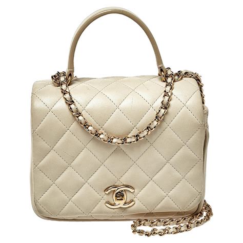 white quilted chanel handbag